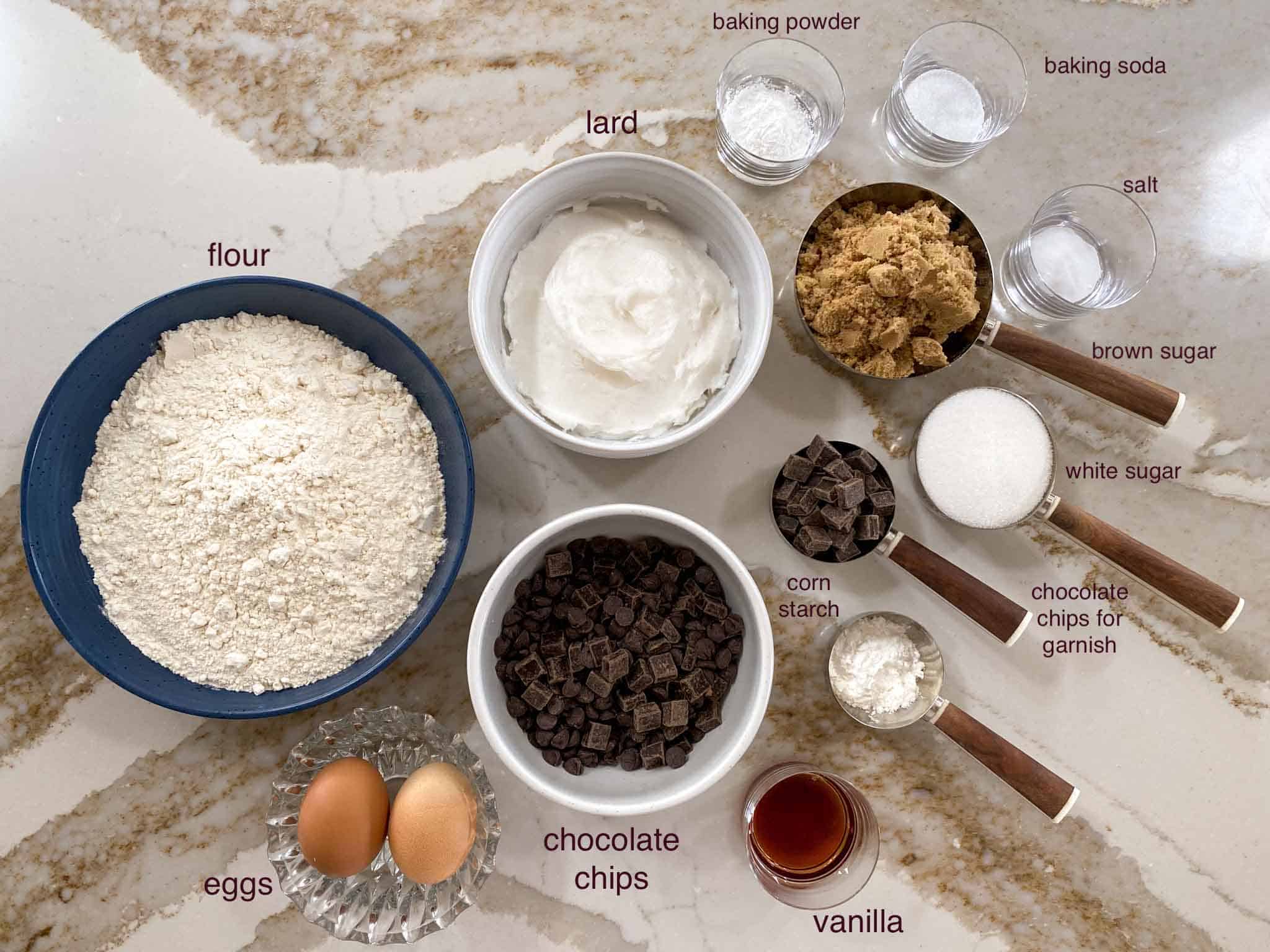 Key ingredients spread out for chocolate chip cookies without butter.