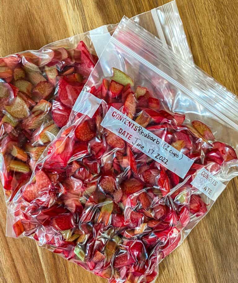 Rhubarb sliced and ready to be frozen in ziploc bags.