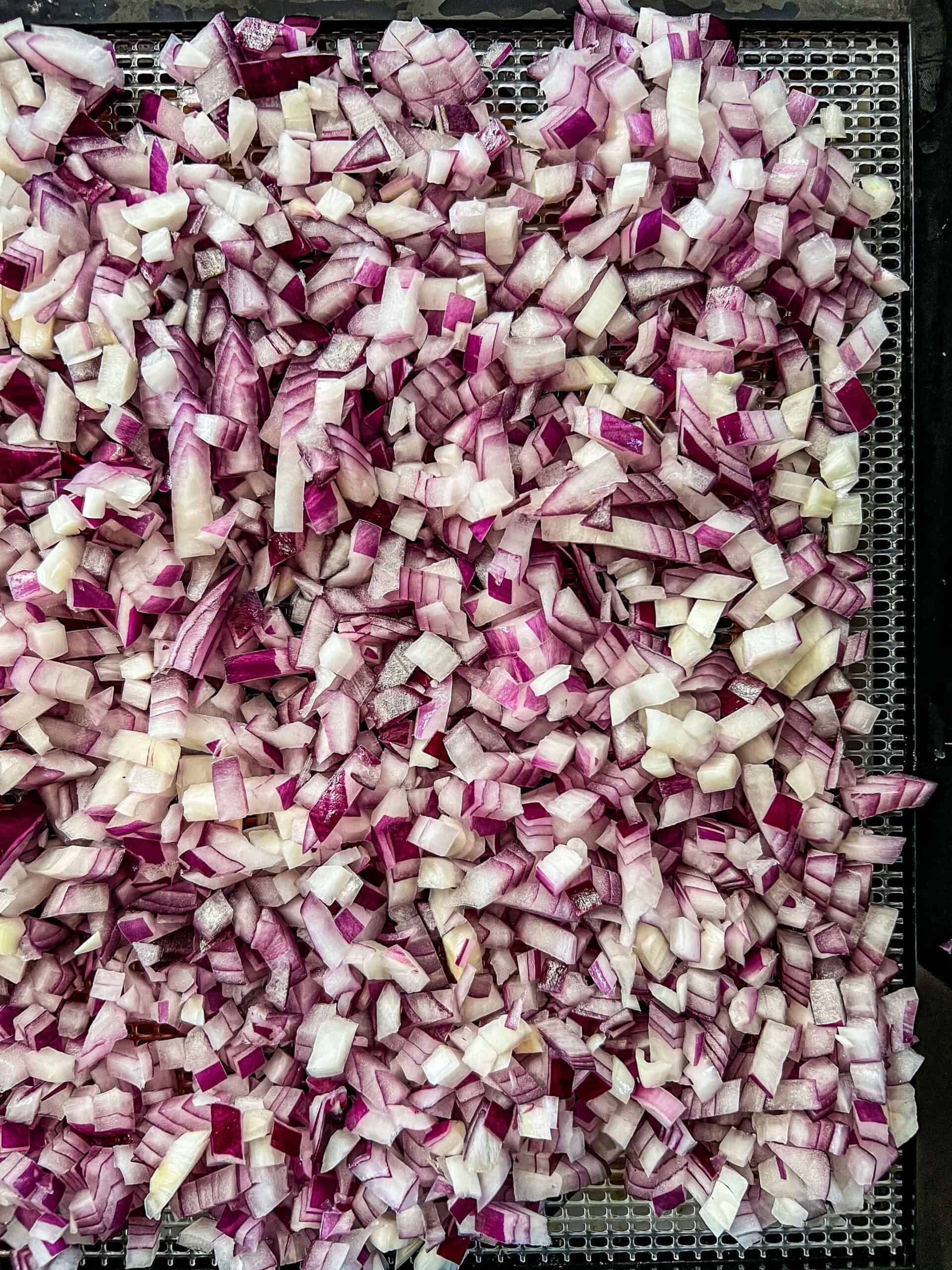 Finely diced onions on an excalibur dehydrator tray.