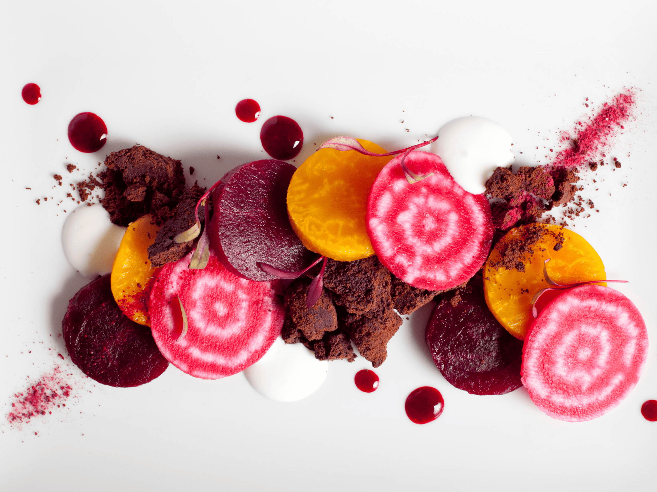 Chioggia beets, golden beets, and red beets sliced up.