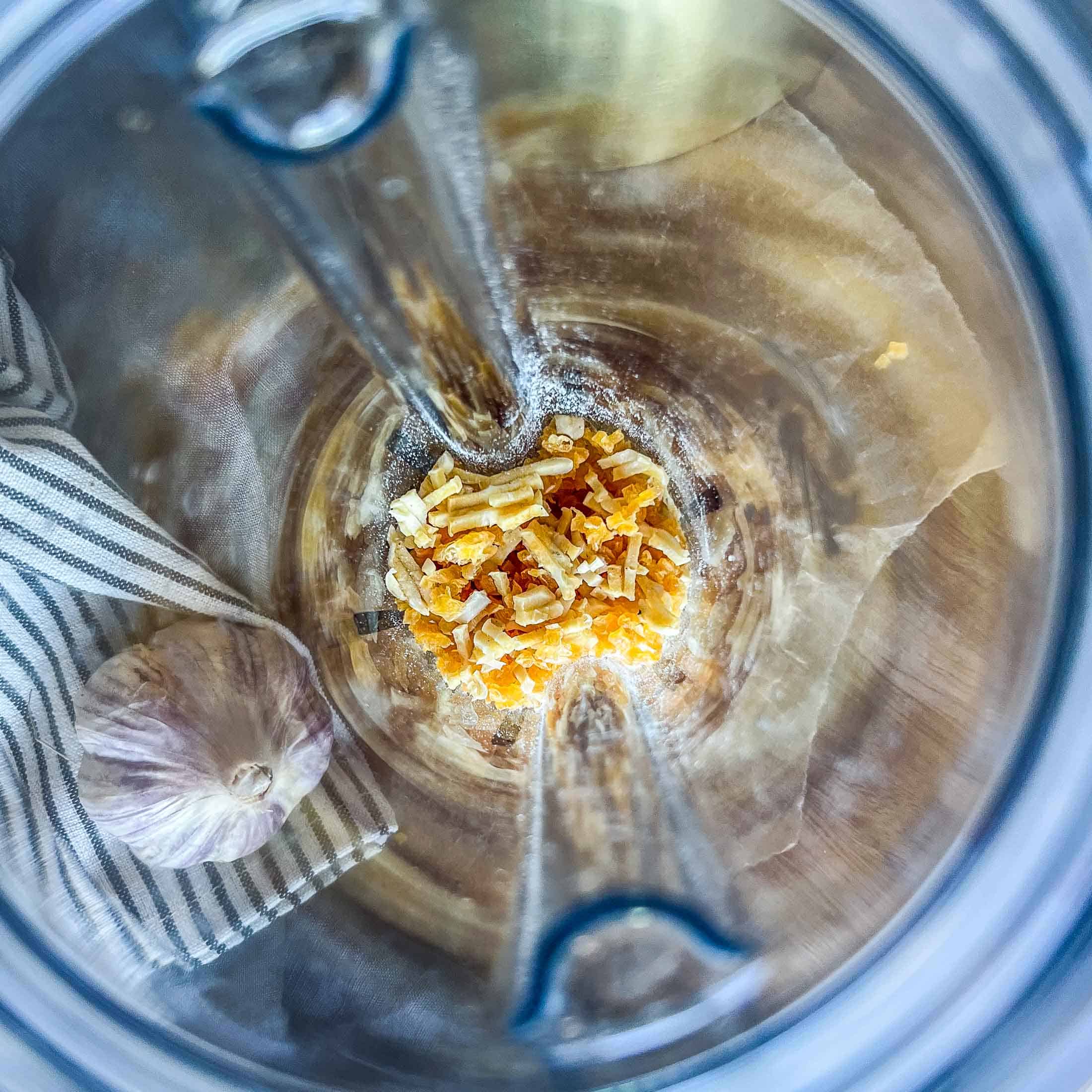 Dried garlic in a vitamix container.